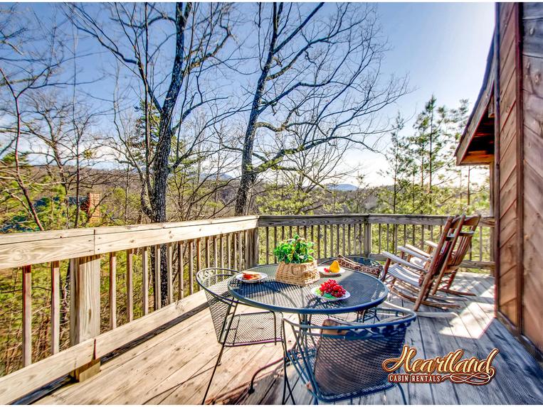 Rocking chairs and sitting are with table and chairs